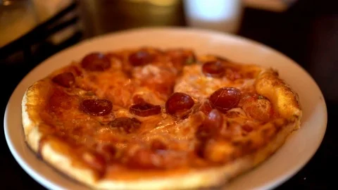 Fresh pizza at restaurant Stock Footage 94598404