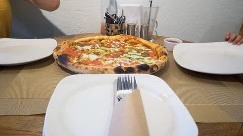 Fresh pizza is surrounded Stock Footage 111401388