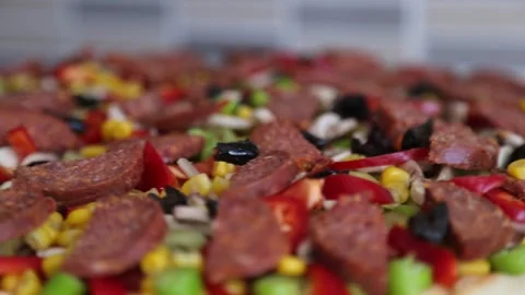 Fresh Pizza Toppings Rotating in Close-Up Stock Footage 343746773