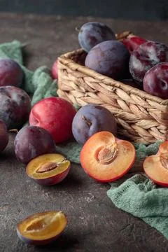 Fresh plums on a dark background Stock Photos