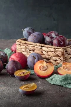 Fresh plums on a dark background Stock Photos