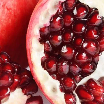 The fresh pomegranate as a background 스톡 사진