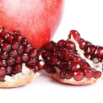 The fresh pomegranate as a background Stock Photos