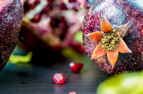 Fresh pomegranates on table Stock Photos