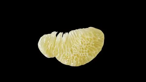 Fresh pomelo pulp slice on black background. Stock Photos