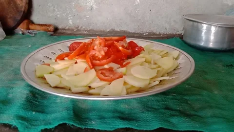 Fresh Potatoes and Tomatoes Cut in a Steel Plate Video stock 346878292