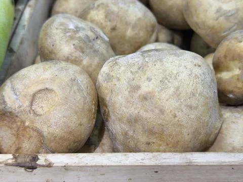 Fresh potatoes in a crate. Photos