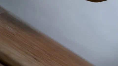 Fresh potatoes falling on chopping board in slow motion Stock Footage 100007869