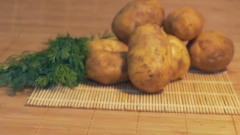 Fresh Potatoes on Table Stock Footage 74165221