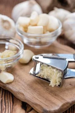 Fresh pressed garlic Stock Photos