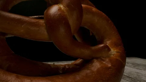 Fresh pretzel placed on table. Stock Footage 123900666