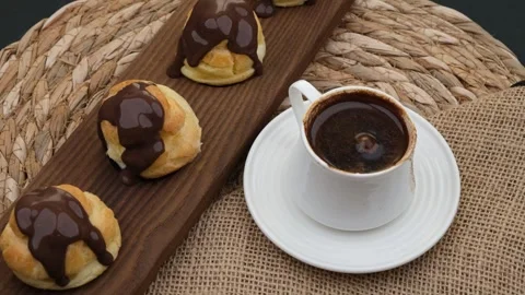 Fresh profiterole and coffee Stock Footage 260413330