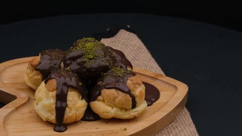 Fresh profiterole rotate Stock Footage 260162657