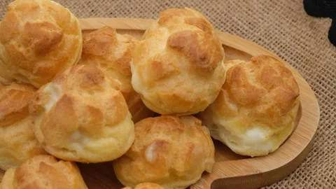 Fresh profiterole rotate Stock Footage 260399126