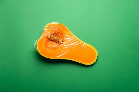 Fresh pumpkin in disposable plastic package Stock Photos