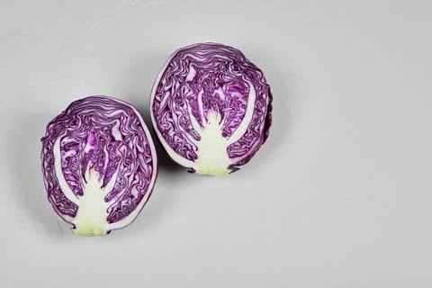 Fresh purple half sliced cabbage isolated on white background Stock Photos