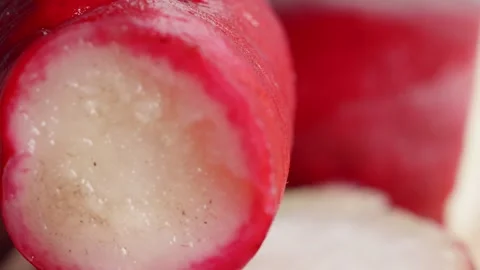 Fresh radish close up rotating camera motion stock footage Stock Footage 336997928