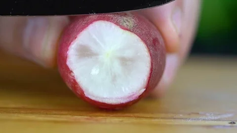 Fresh radish is cut Video stock 85225890