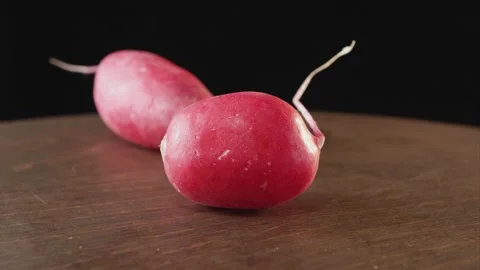 Fresh radish on a dark background close-up 스톡 동영상 131980761