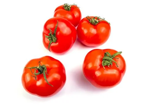 Fresh rape tomatoes on a table. Flat lay Stock Photos