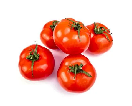 Fresh rape tomatoes on a table. Flat lay Stock Photos