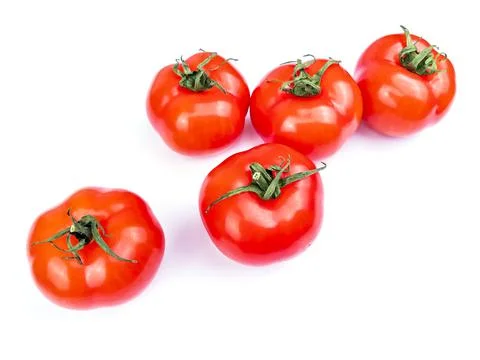 Fresh rape tomatoes on a table. Flat lay Stock Photos