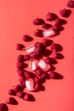 Fresh raspberries and ice cubes. Berries lemonade ingredients Stock Photos
