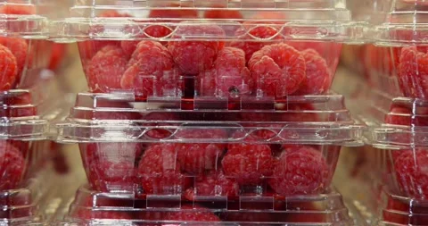 Fresh Raspberries Stacked in Plastic Containers Stock Footage 325068885
