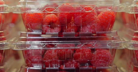 Fresh Raspberries Stacked in Plastic Containers Stock-Footage 335763661