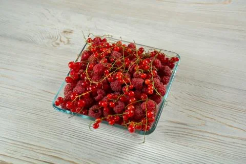 Fresh raspberry and red currant Stock Photos