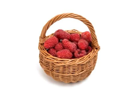 Fresh raspberry in a basket isolated Stock Photos