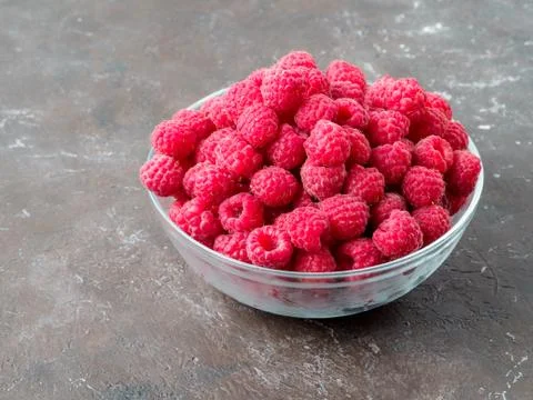 Fresh raspberry in the bowl. Stock Photos