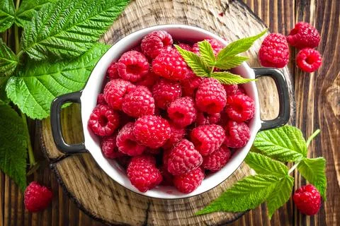 Fresh raspberry with leaves Stock Photos