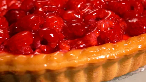 Fresh raspberry pie covered with jelly Stock Footage 106359349