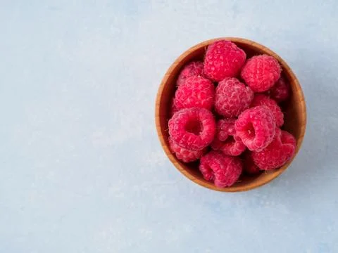 Fresh raspberry in the plate. Stock Photos