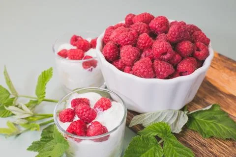 Fresh raspberry in a white plate Stock Photos
