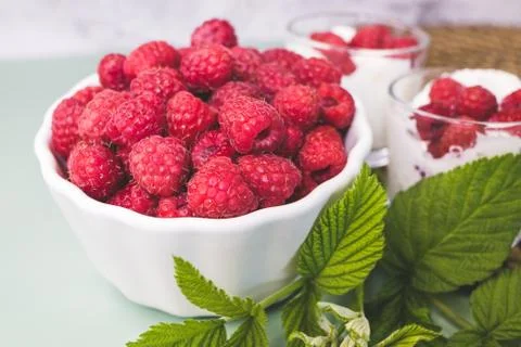 Fresh raspberry in a white plate Stock Photos