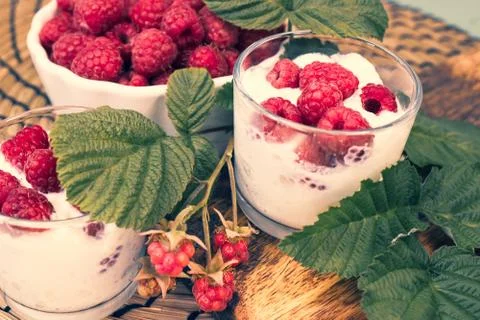 Fresh raspberry in a white plate Stock Photos