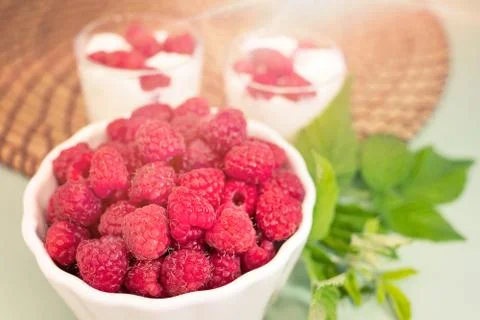 Fresh raspberry in a white plate Stock Photos