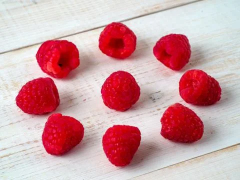 Fresh raspberry on wooden background. Stock Photos