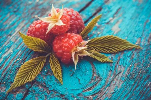 Fresh raspberry on a wooden table Stock Photos