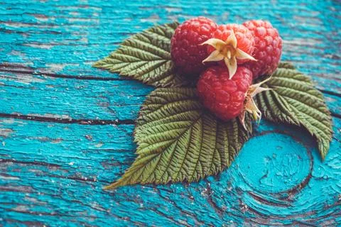 Fresh raspberry on a wooden table Stock Photos