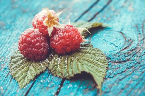Fresh raspberry on a wooden table Stock Photos