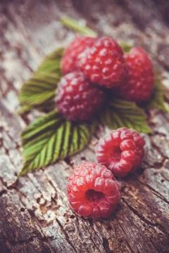 Fresh raspberry on a wooden table Stock Photos