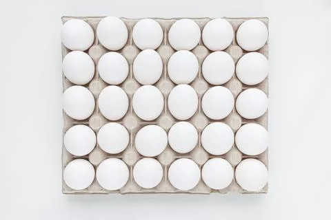 Fresh raw 30 pack of large eggs white eggs in cardboard. Consumerism, egg Stock Photos