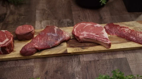 Fresh Raw Beef Meat Cuts On Kitchen Counter Stock Footage 129498330