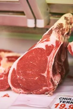 Fresh raw beef ribeye cut displaying marbling and bone Stock-Fotos