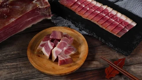Fresh Raw Beef Slices and Cubes on Dark Wooden Table Vidéo 340455636