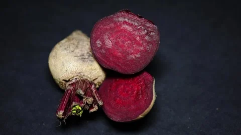 Fresh raw beetroot slice close-up studio shot on black background Stock Footage 298175604