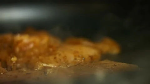 Fresh raw chicken breast spiced with mexican spice mix being fried on a frying Stock Footage 151287992